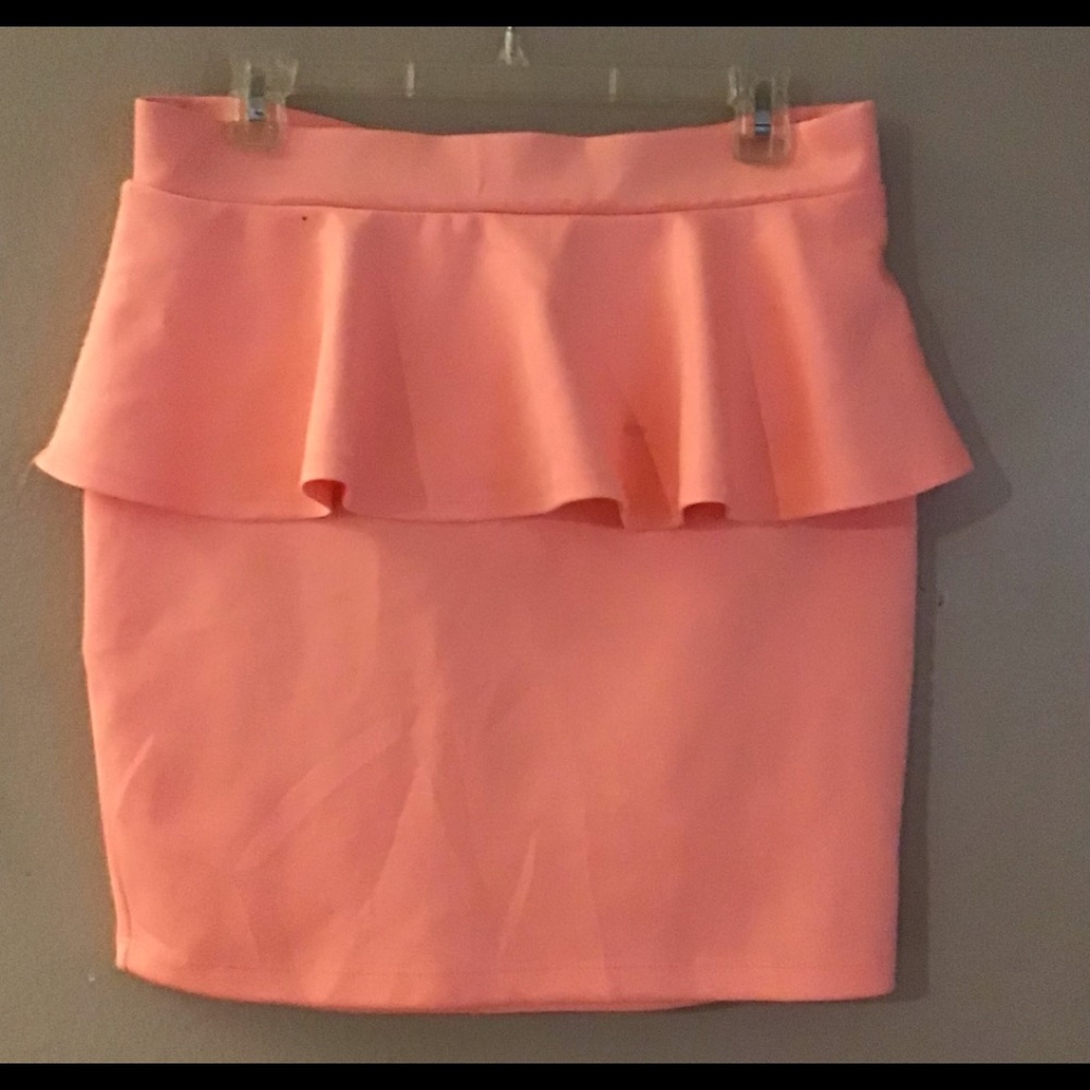 BEBE! peplum style pencil skirt in peach/orange